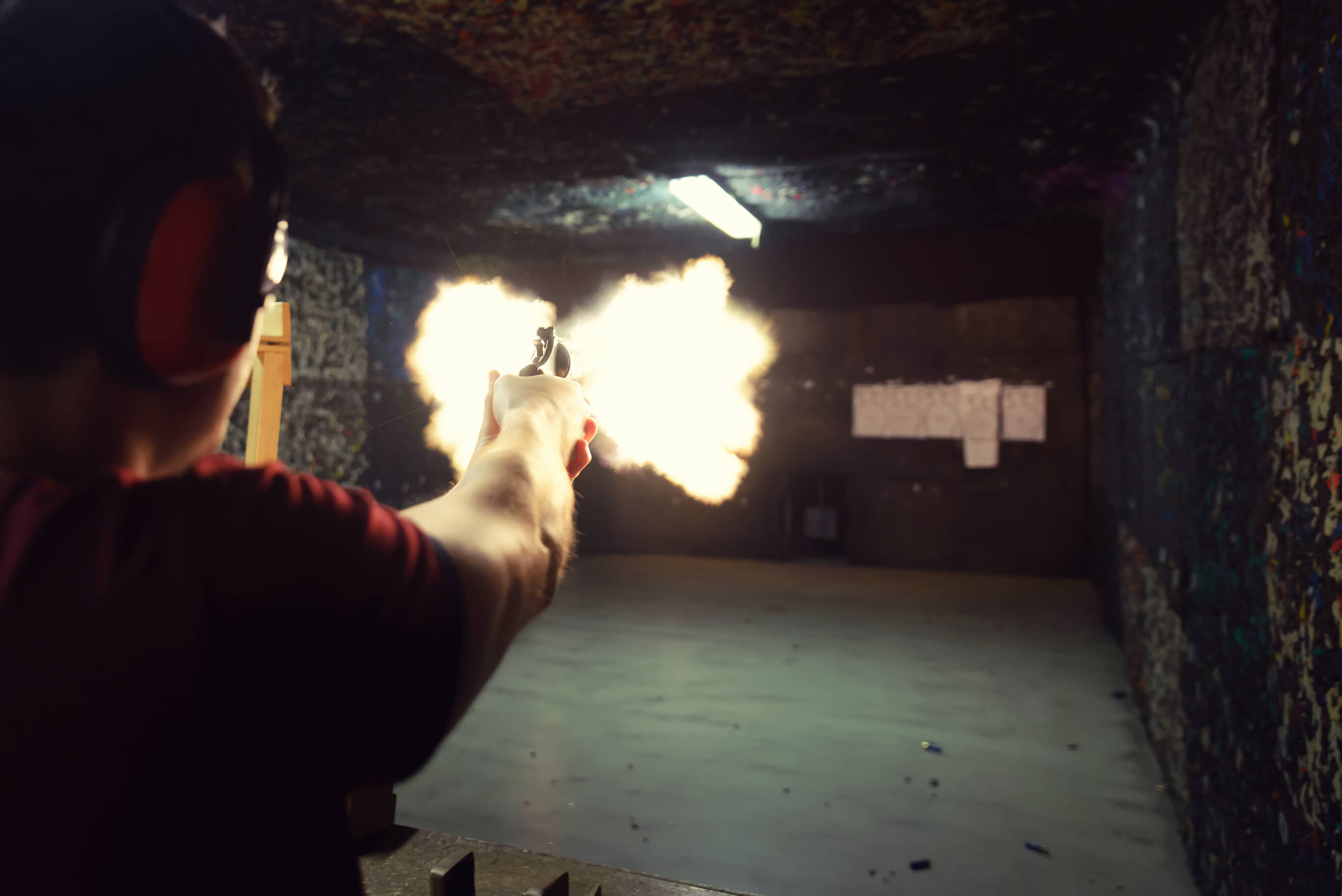 Shooting in a shooting range with real weapons photo