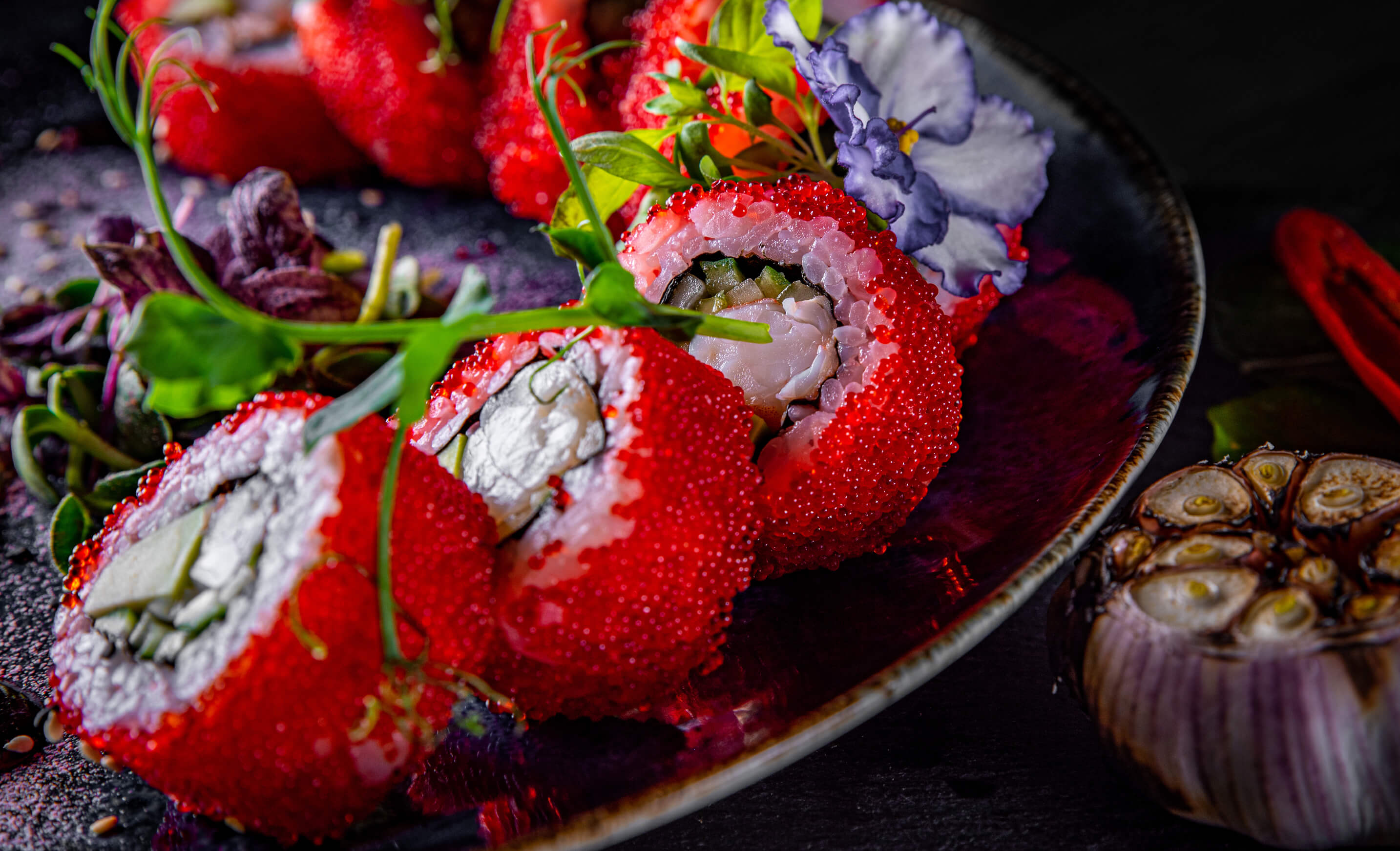 Sushi tasting on a naked male body photo